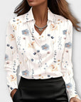 Shiny blouse with ruched collar