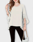 Aria - The perfect spring blouse with a round neckline
